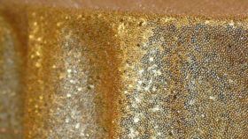 Image of a 108" Round Gold Sequin Tablecloths