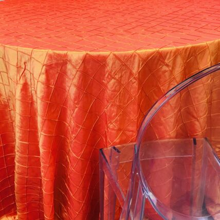Pintuck Fire Orange tablecloth linen rental