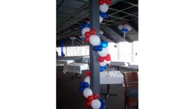 Image of a 10' Air Filled 12" Latex Link Garland w/ 5" Clusters