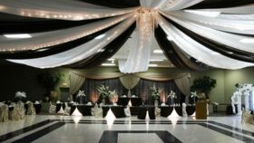 Image of a Black and White Ceiling Drape with White Lighting 20x20