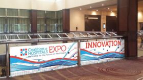 Image of a CL04 - Sheraton Centre Branding: Concourse Level - Glass Railing OPTION 1A (FULL PANEL - SS)