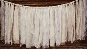 Image of a Vintage Rag Banner: Lace